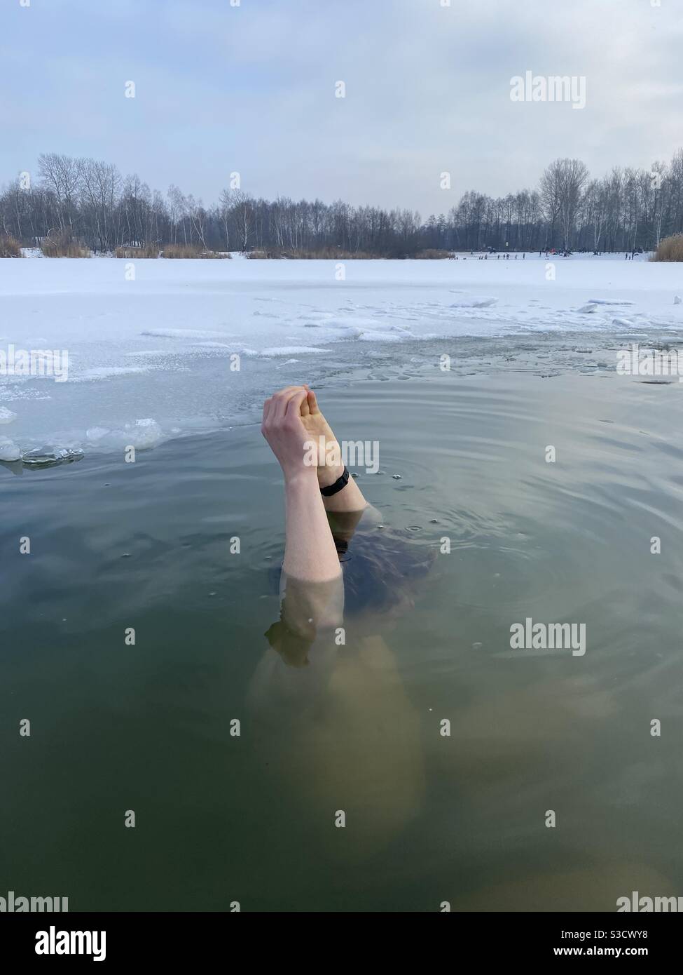Man diving into ice cold water Stock Photo Alamy