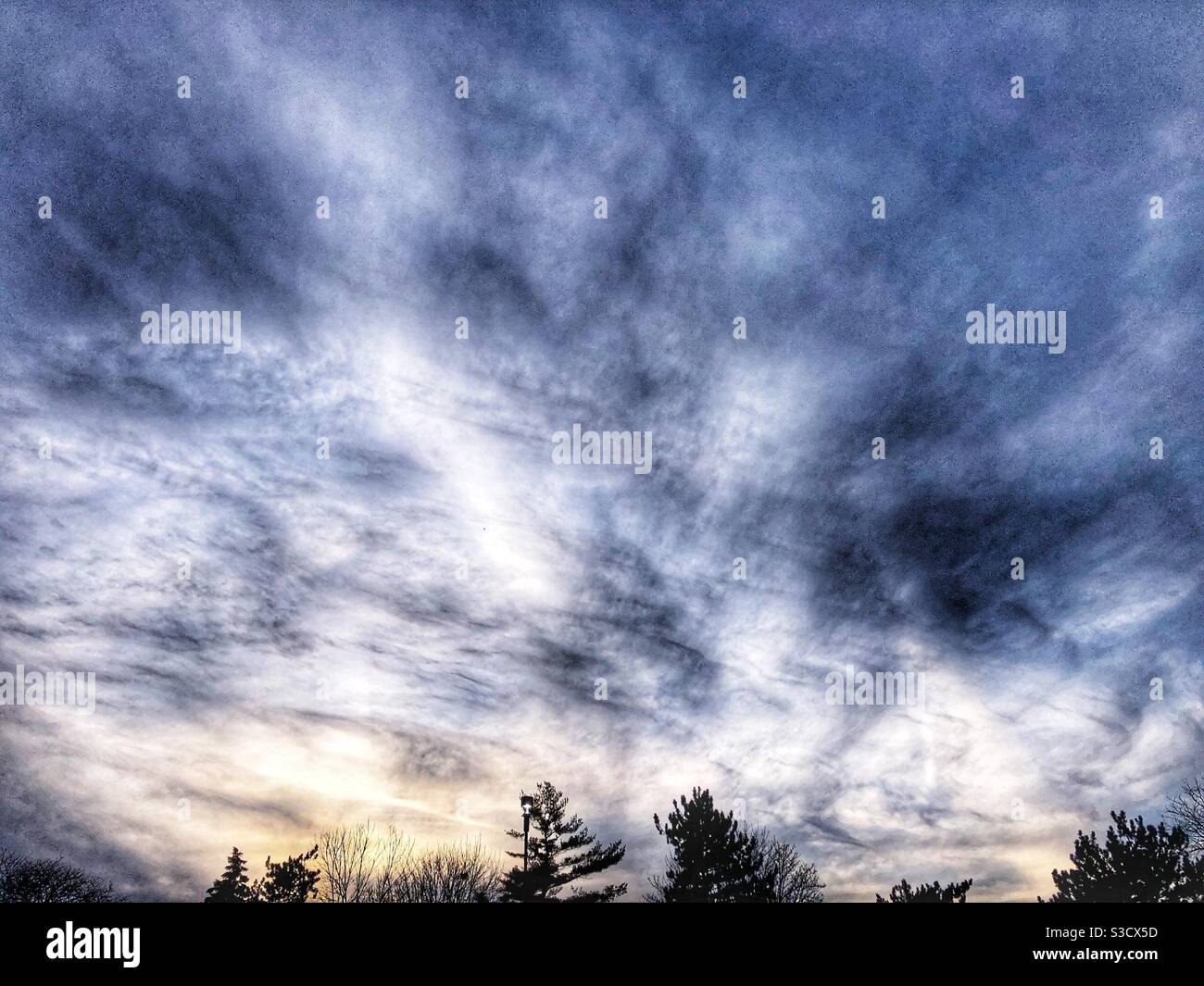 Swirls of clouds in the sky Stock Photo