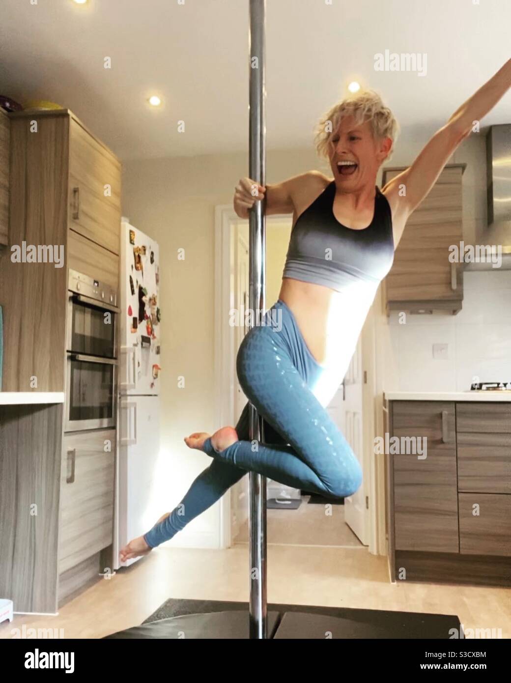 Pole dancing in my kitchen - Smartphone Captured Stock Image