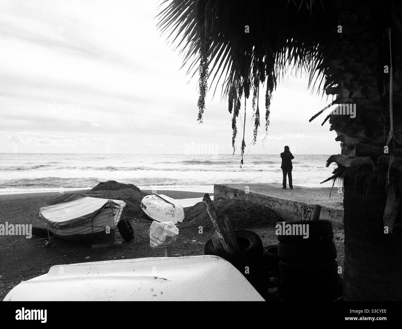 Silhouette of Man standing by the sea - Smartphone Captured Stock Image