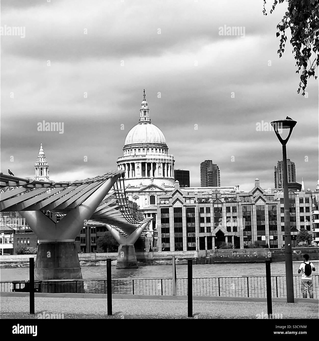 View of St Paul’s Cathedral, London seen from below the Millennium Bridge. Stock Photo