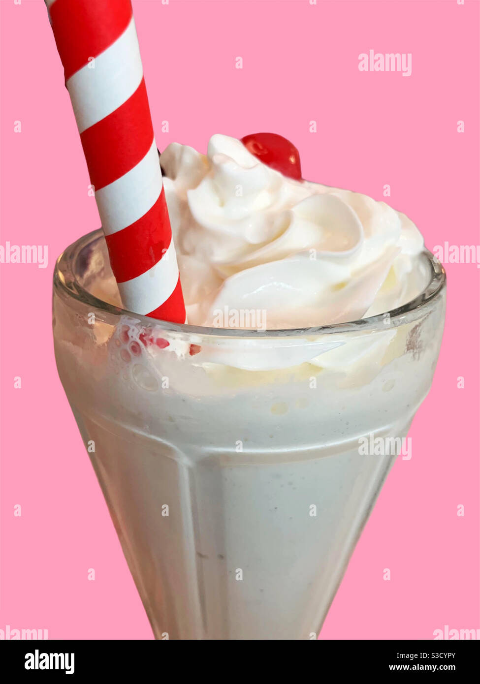 Classic Vanilla Ice Cream Milkshake from an American Diner with a Cherry on top and a Vintage