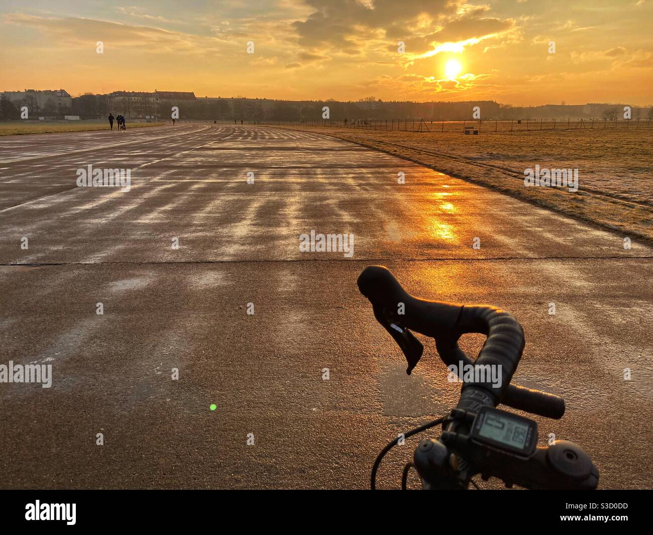 A Bicycle on a Winter Morning Commute at Sunrise on Tempelhofer Feld, Berlin - Smartphone Captured Stock Image