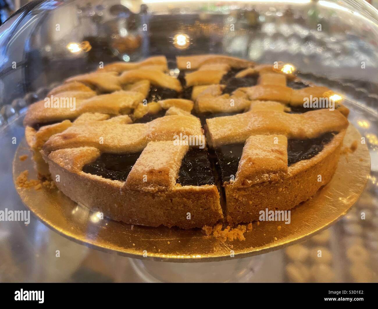 Tart with plum jam exposed at the bar Stock Photo