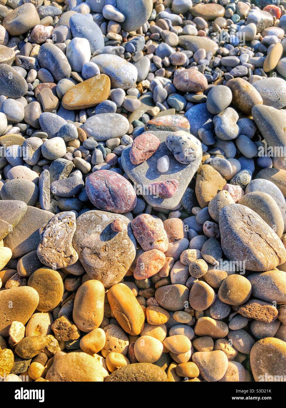 Artwork on the rocky beach. - Smartphone Captured Stock Image