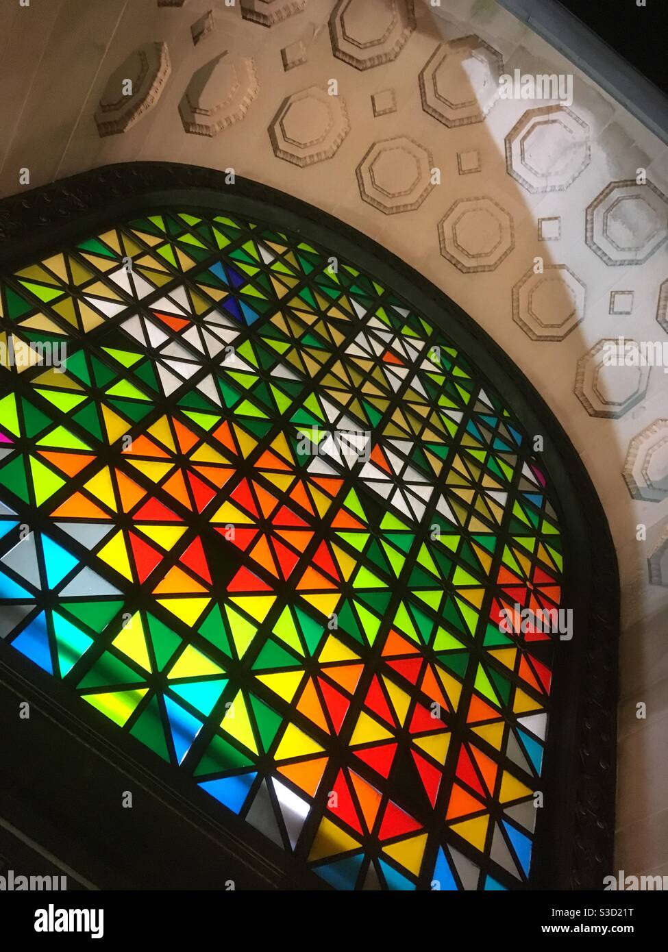 Colourful stained glass window at Brangwyn Hall, Swansea Stock Photo