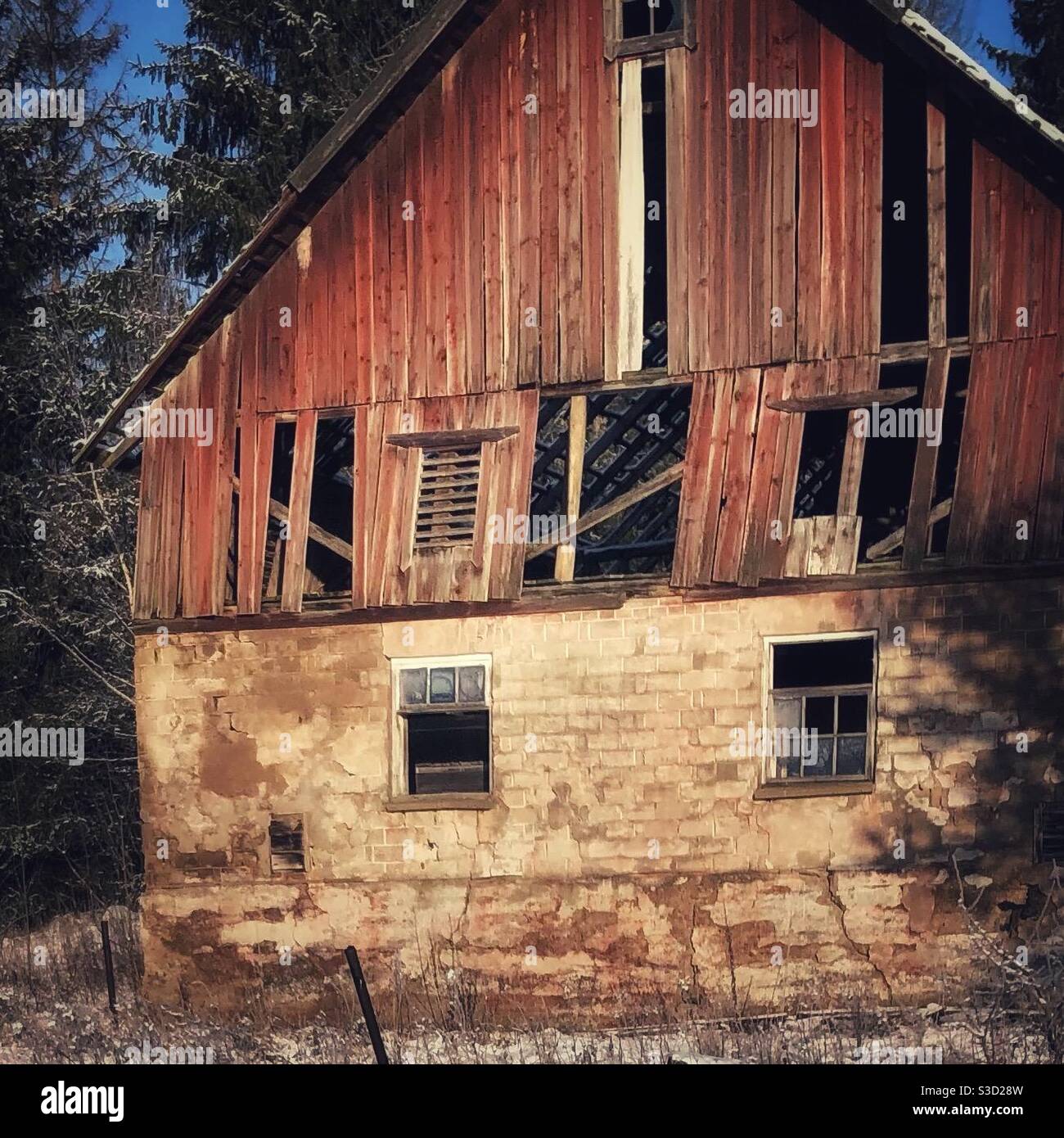 Abandoned old wooden barn at the Swedish countryside. - Smartphone Captured Stock Image