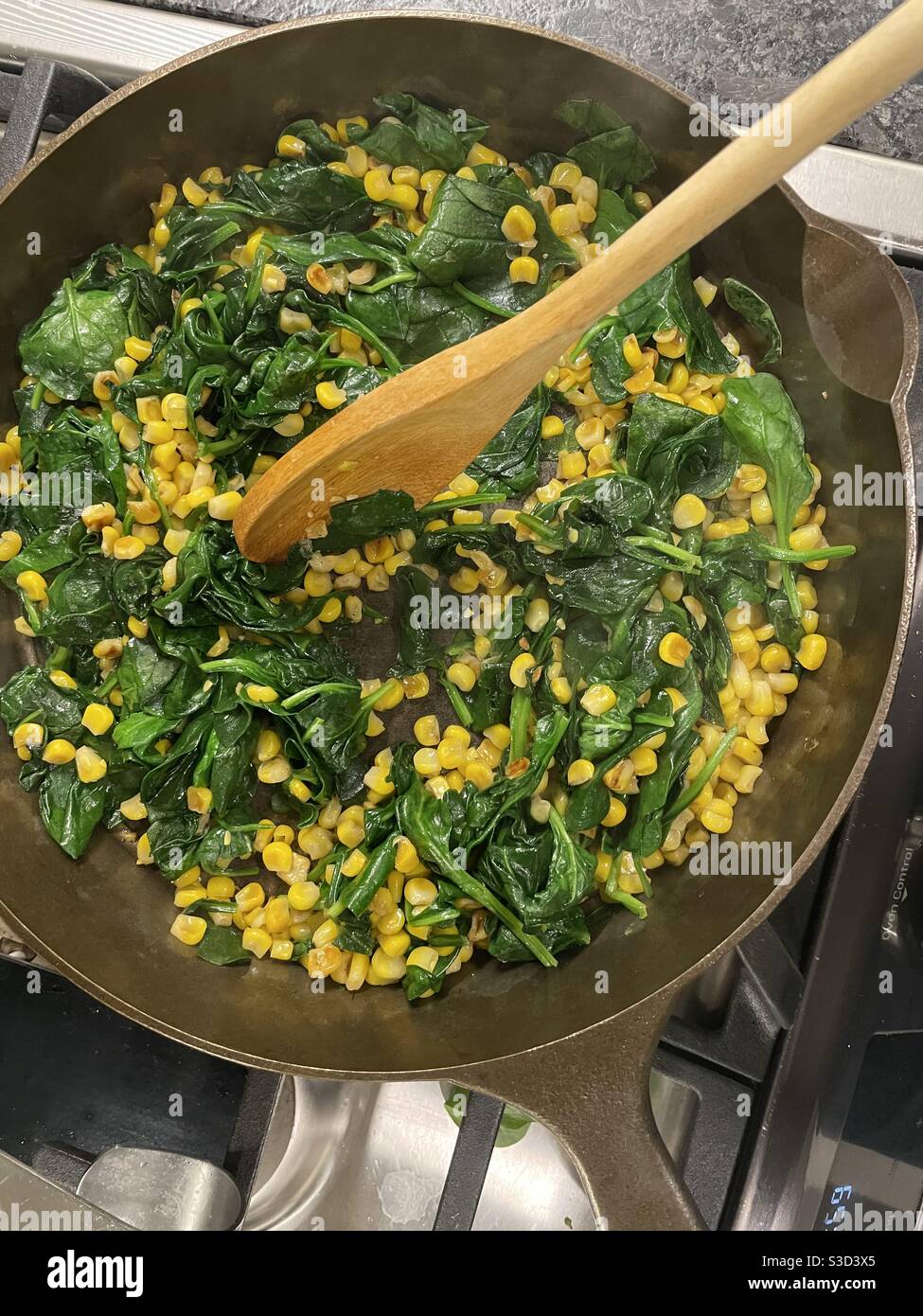 Mexican food preparation in cast iron skillet - Smartphone Captured Stock Image