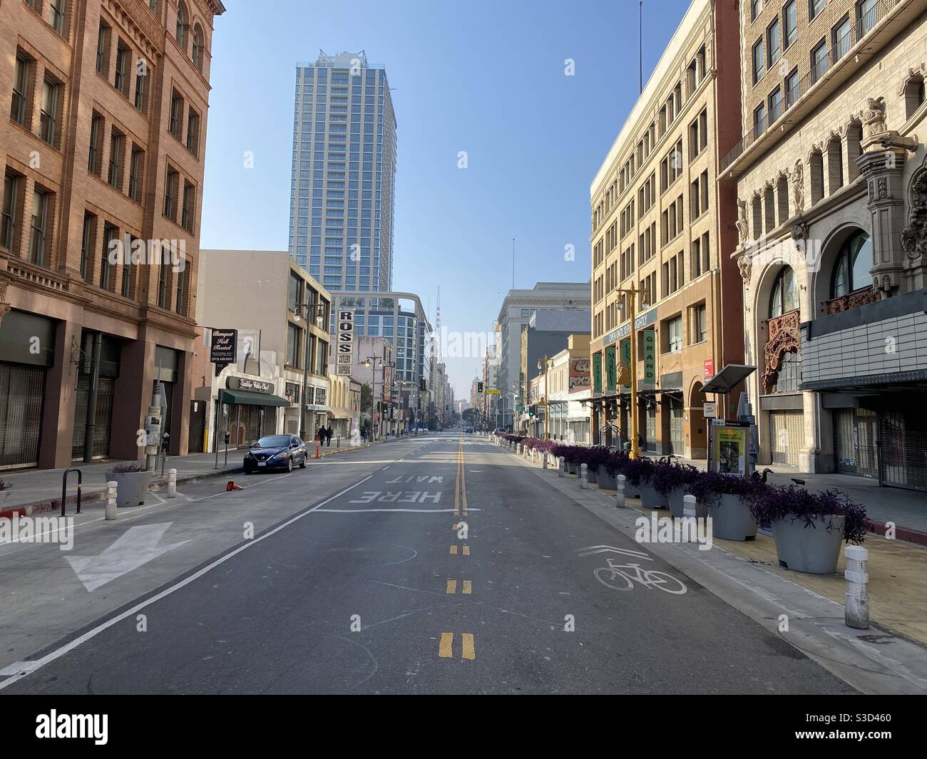 LOS ANGELES, CA, NOV 2020: looking south down mostly empty Broadway from the Million Dollar Theater and Bradbury Building in historic neighborhood of Downtown during Covid-19 pandemic Stock Photo