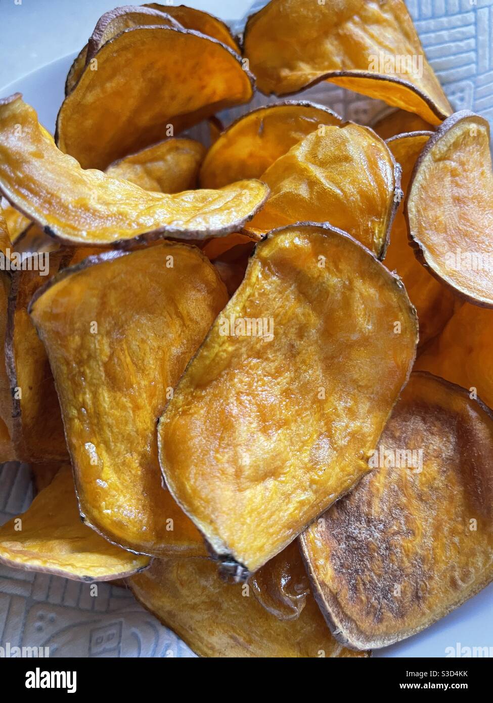 Home made sweet potato crisps - Smartphone Captured Stock Image