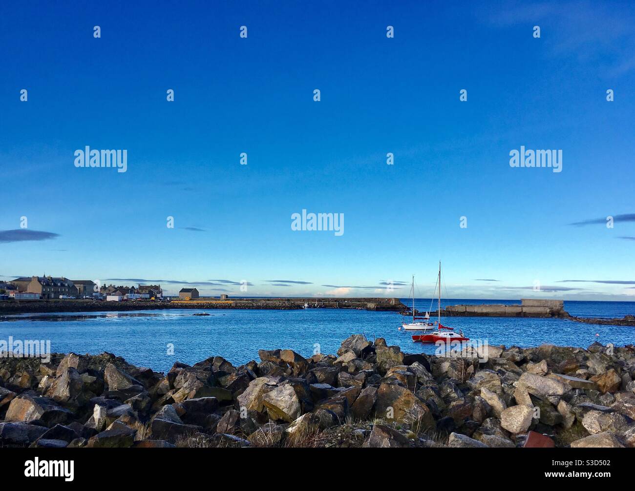 Sandhaven Harbour, Scotland - deep blues on a Winter’s Day. Stock Photo