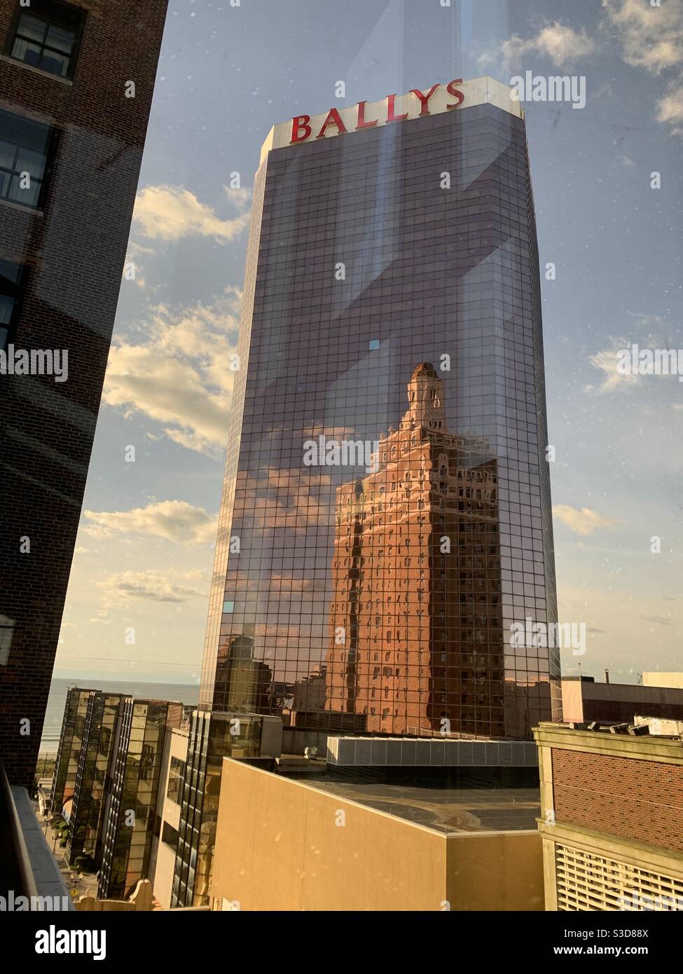 The Claridge. A Radisson Hotel, reflected in Bally’s Hotel and Casino, Atlantic City, New Jersey, United States - Smartphone Captured Stock Image