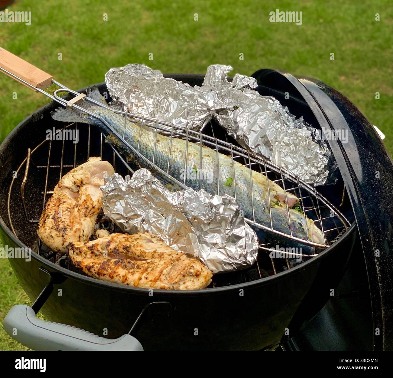Forelle vom Grill (Grilled trout Stock Photo - Alamy