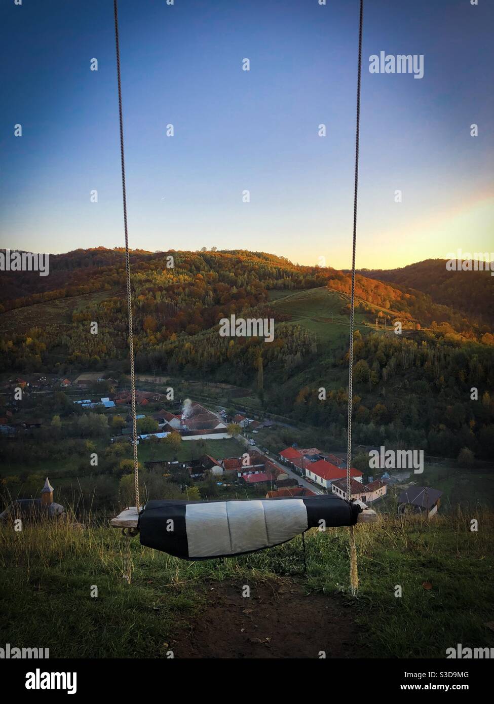 Rope swing at the top of the mountains - Smartphone Captured Stock Image