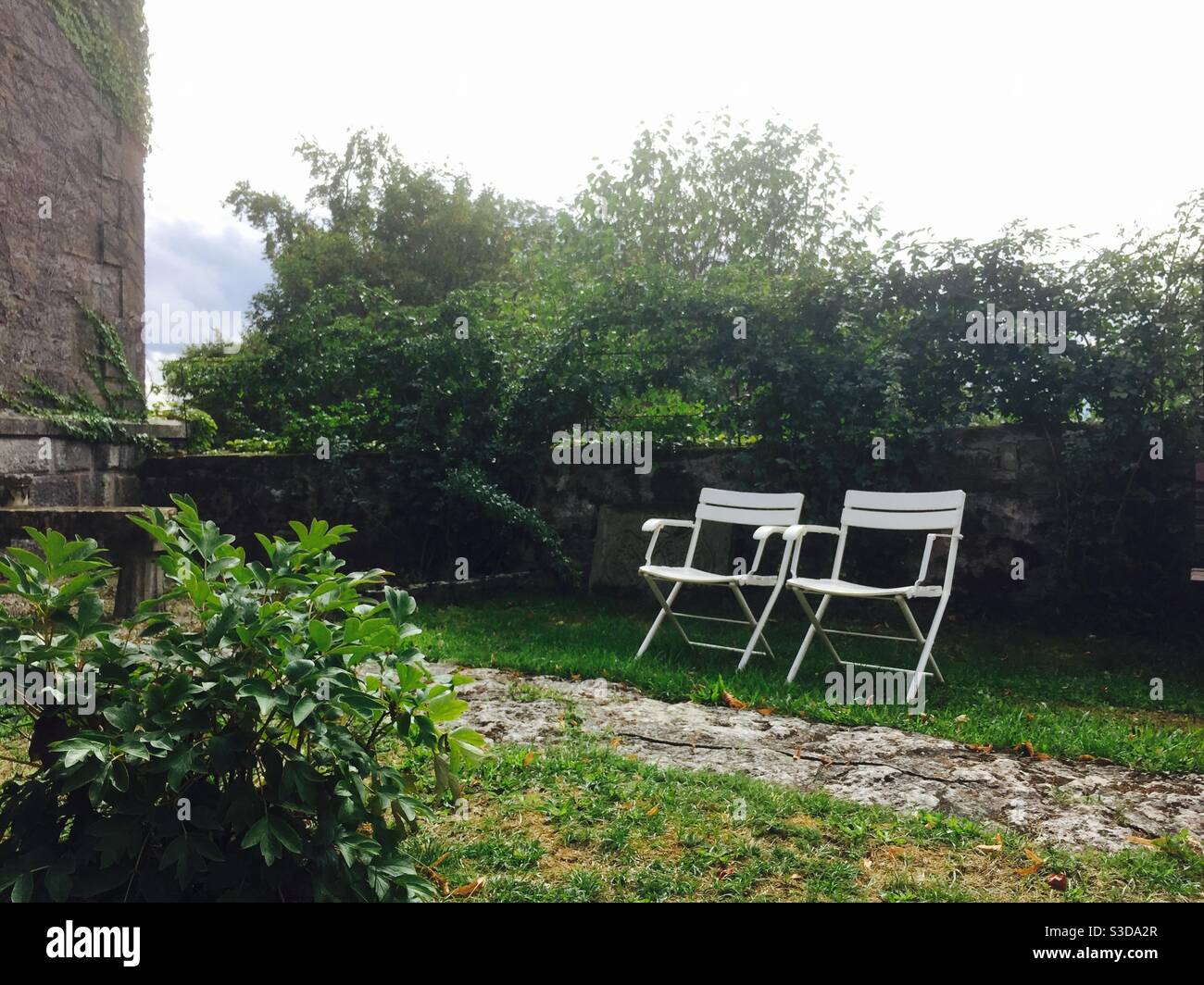 Empty chairs in the garden - Smartphone Captured Stock Image