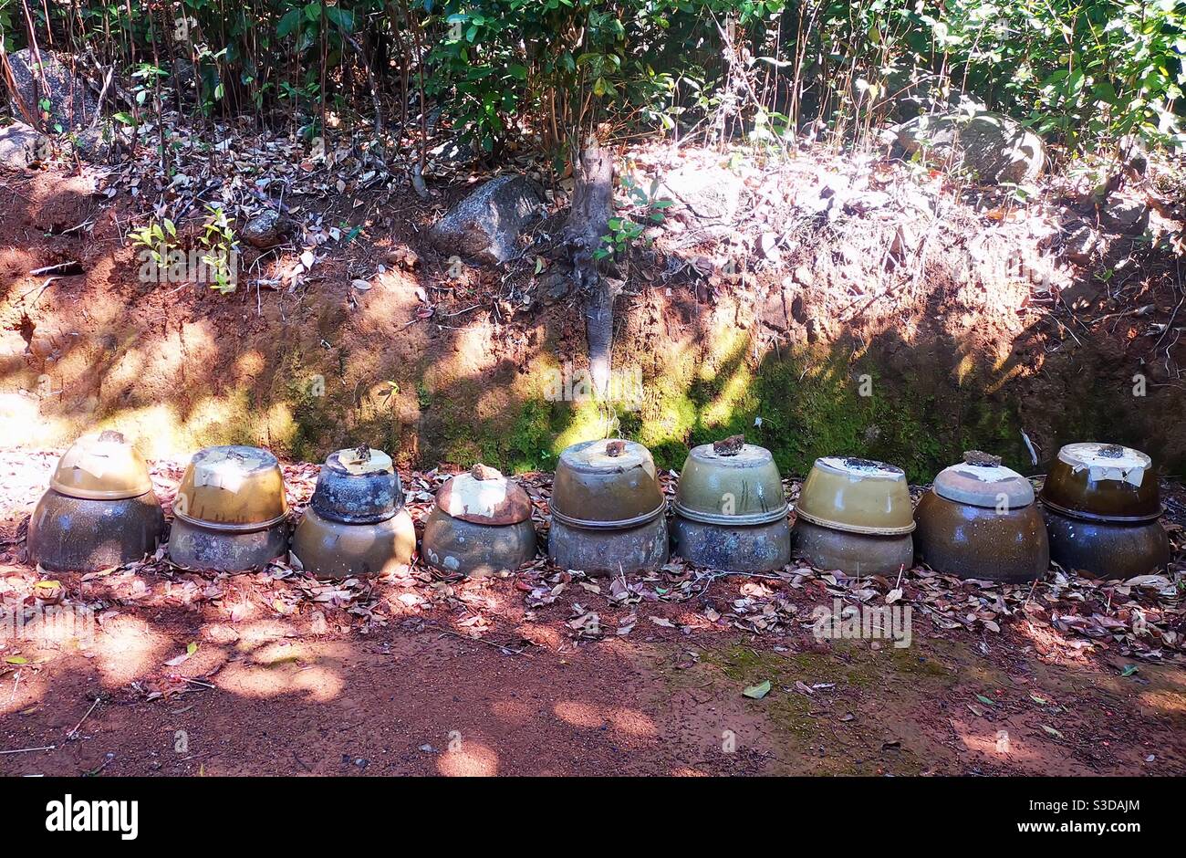 Traditional jars in a local cemetery on Lamma island in Hong Kong. Stock Photo