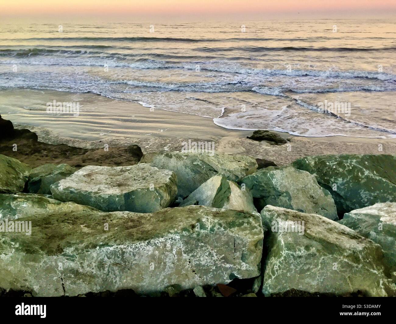 Waves and rocks Stock Photo