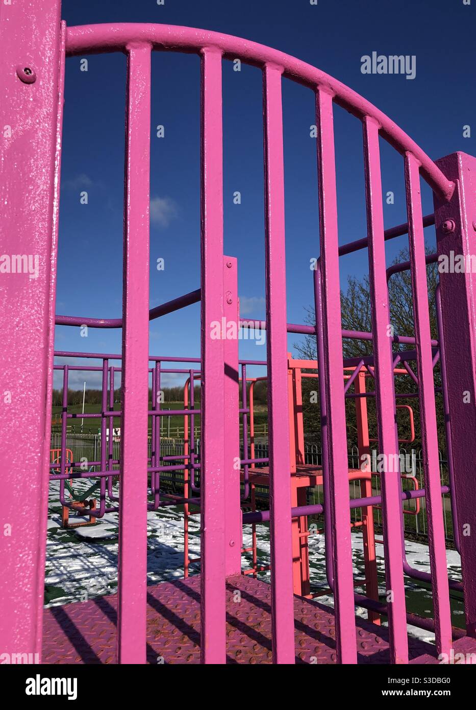 Abstract formed by painted metal in a children’s playground - Smartphone Captured Stock Image