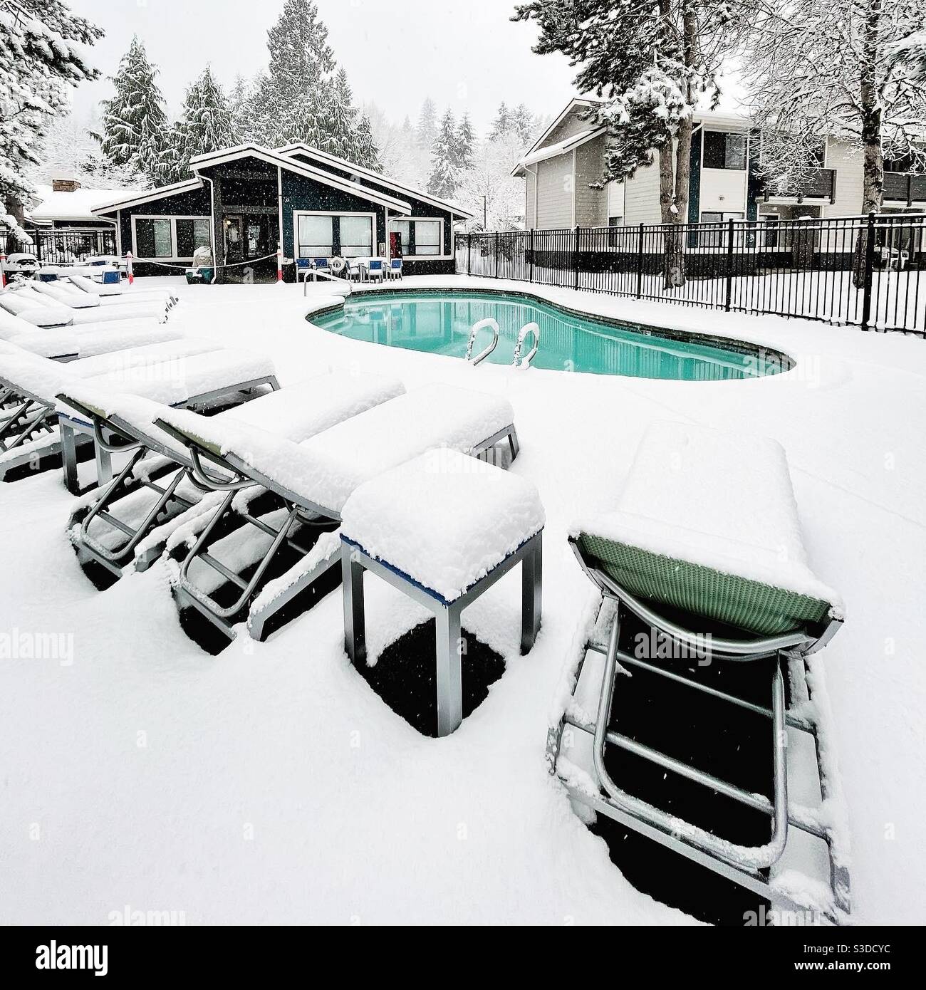 Swimming pool is waiting for better weather Stock Photo - Alamy
