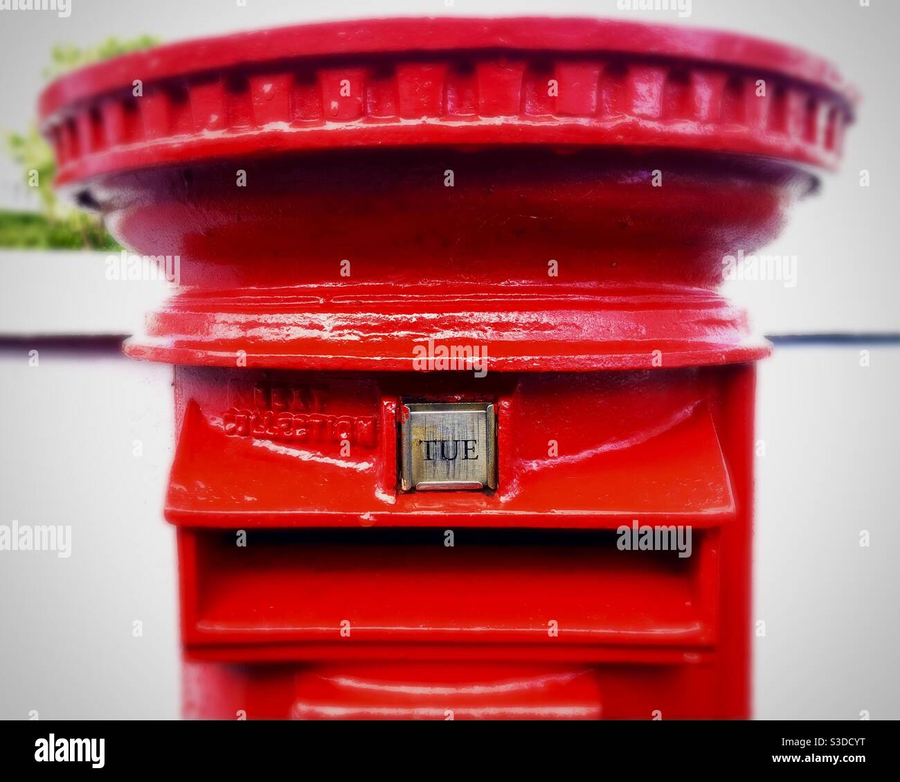 Post box with next collection Tuesday Stock Photo