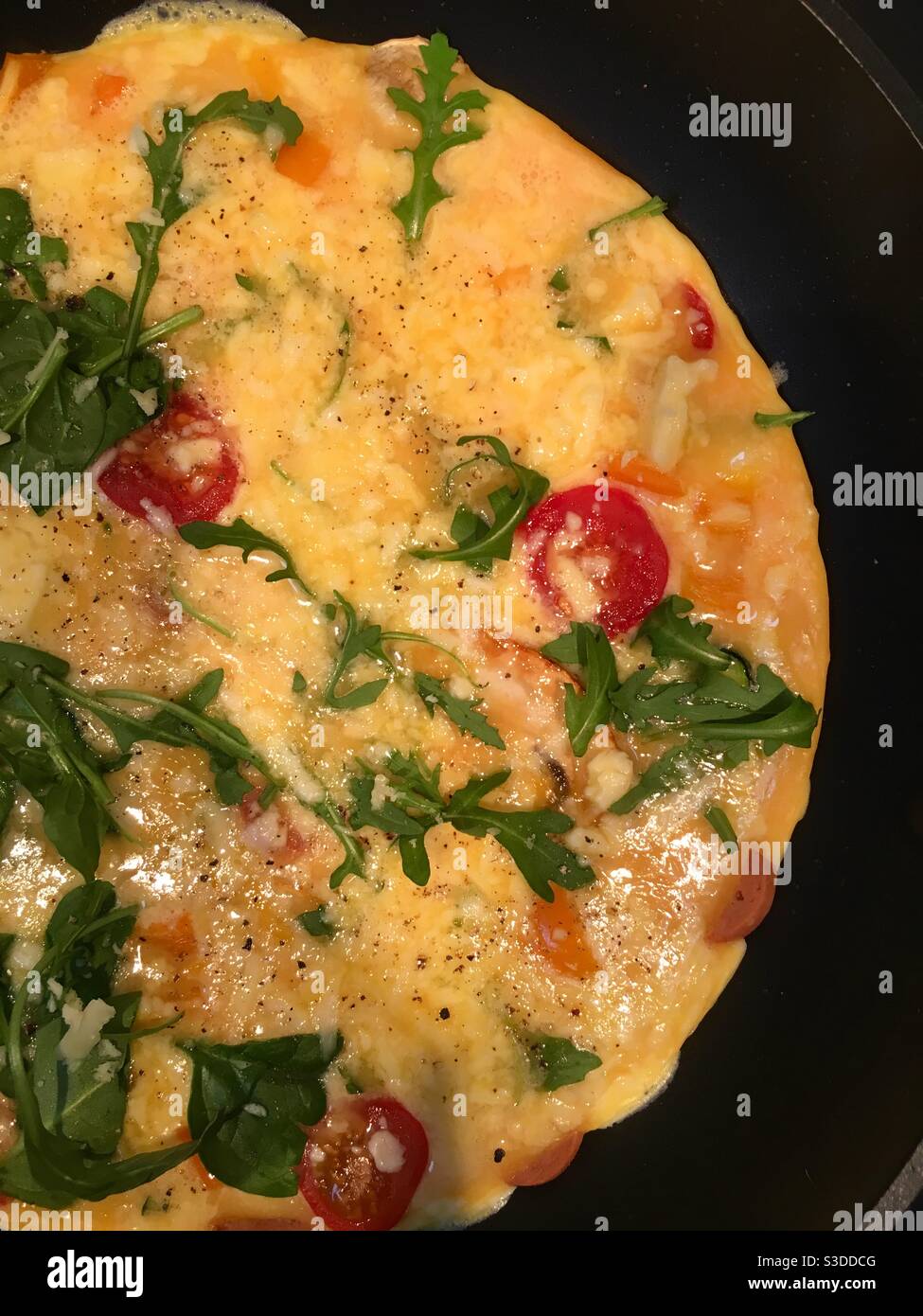 Vegetable Frittata omelette in frying pan - Smartphone Captured Stock Image