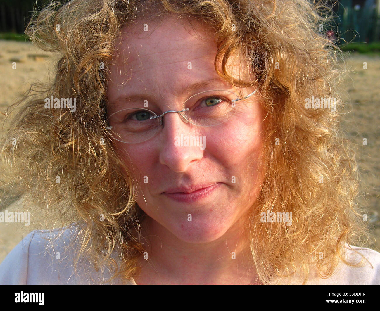 Portrait of a woman with curly hair - Smartphone Captured Stock Image