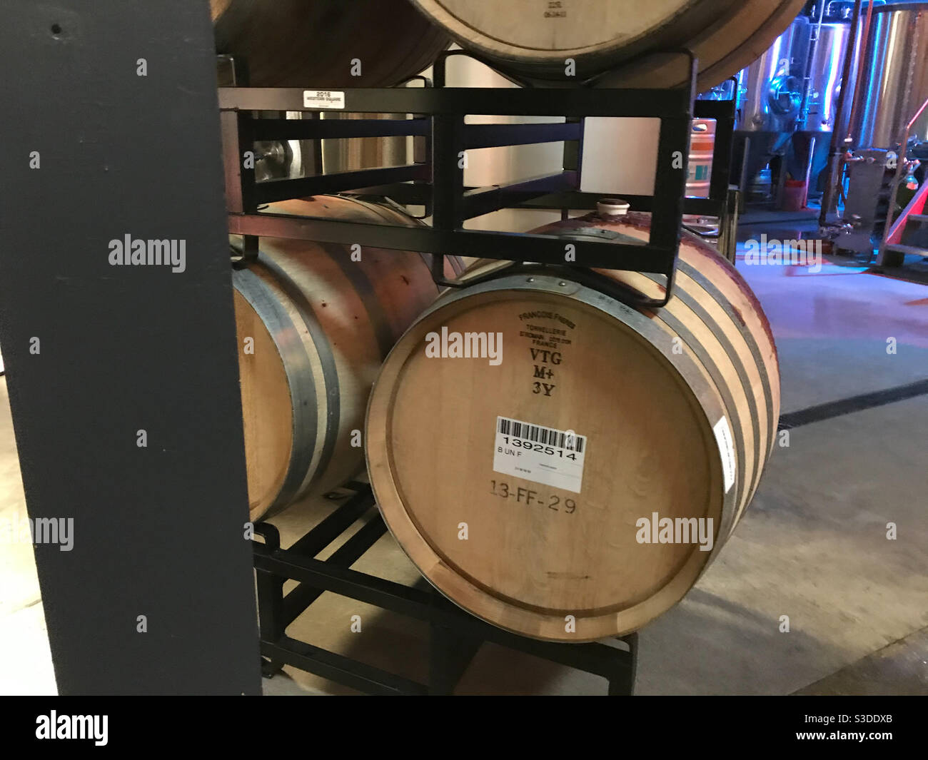 Wooden barrels to age craft beer Stock Photo