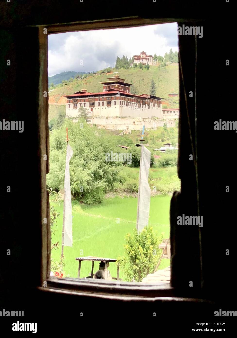 Rinpung Dzong through a window, Paro Dzongkhag, Bhutan - Smartphone Captured Stock Image