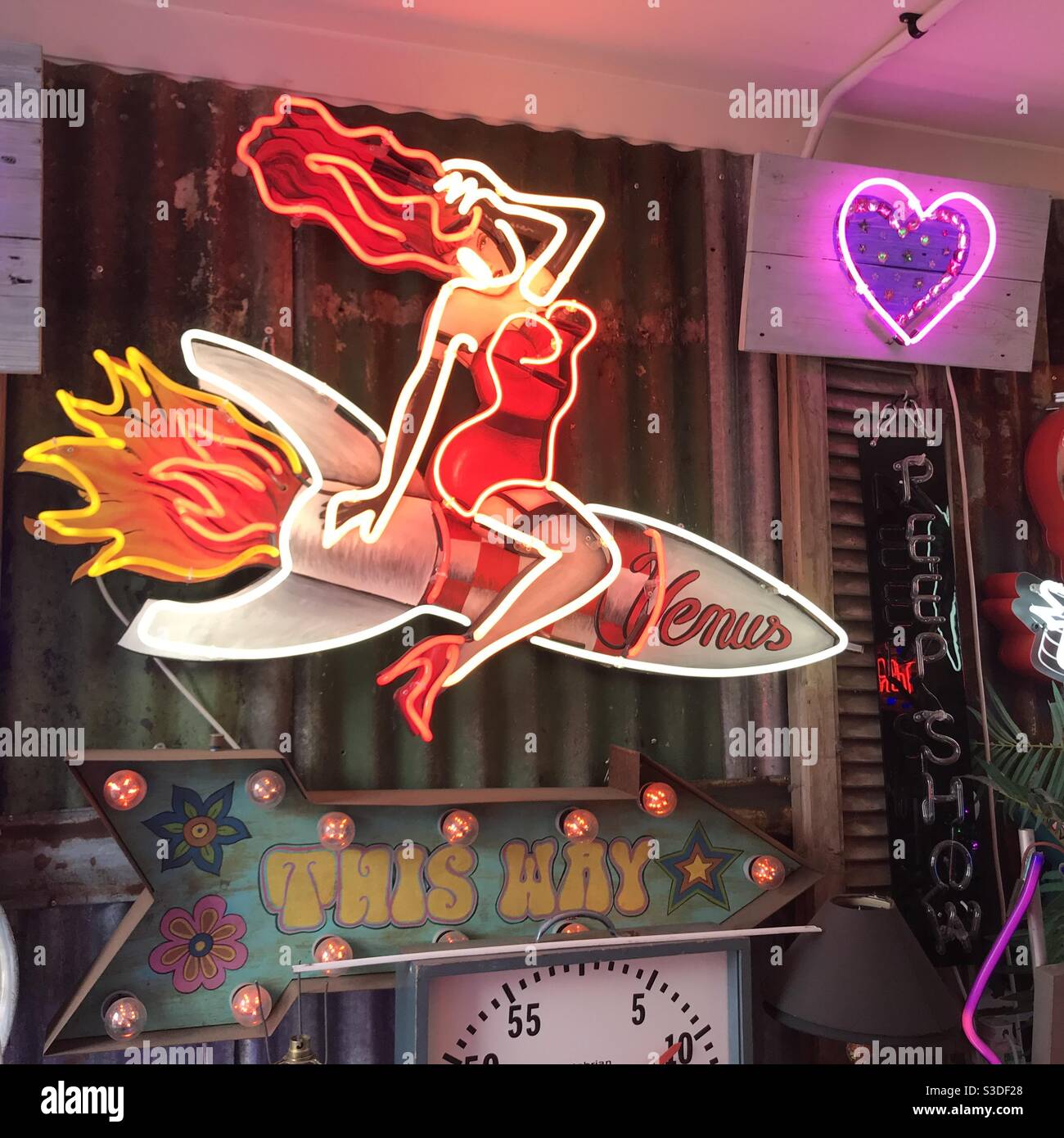 Burlesque lady on a rocket neon sign Stock Photo