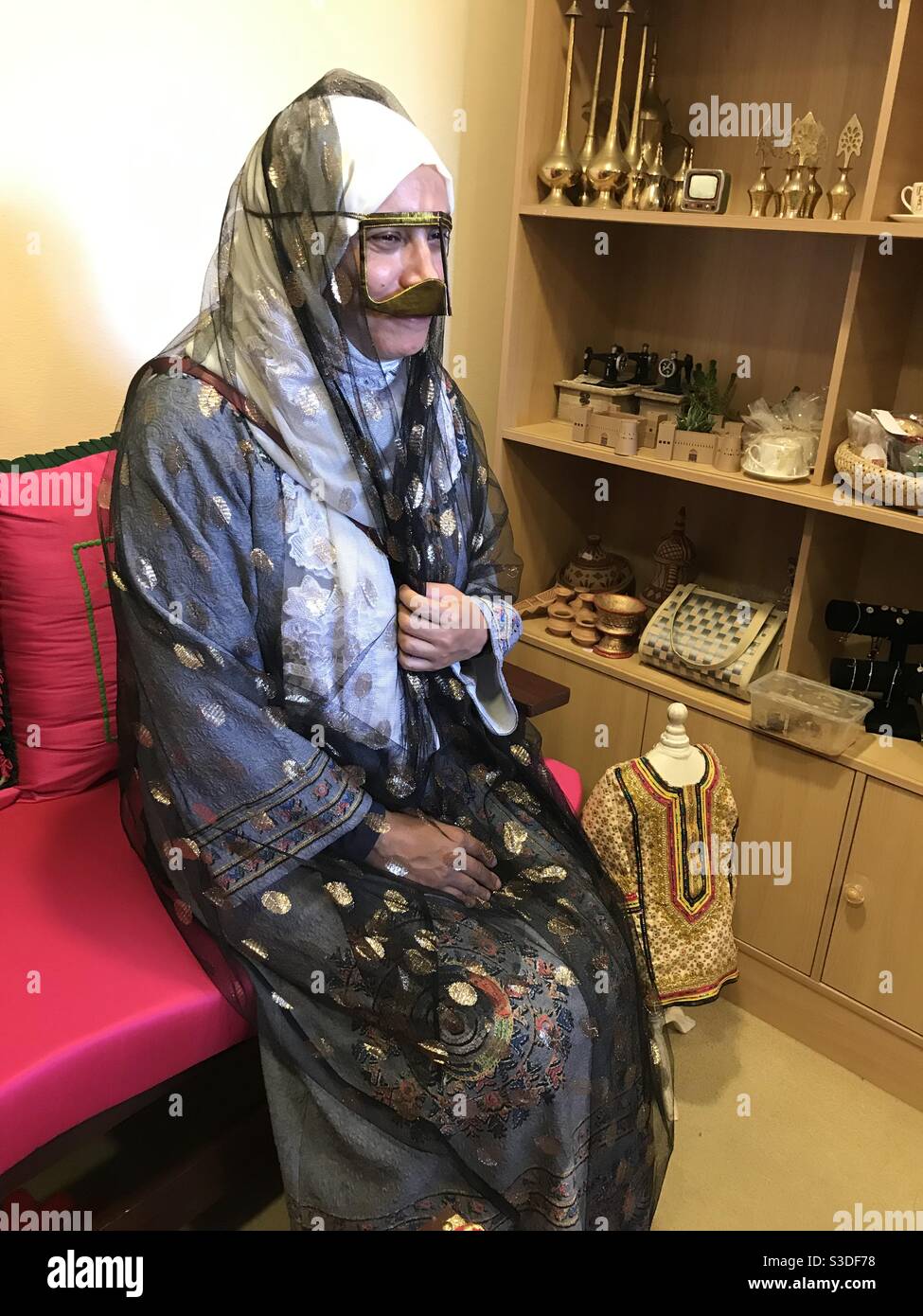 A woman wearing traditional outfits of Musandam area (Northern Oman) - Smartphone Captured Stock Image