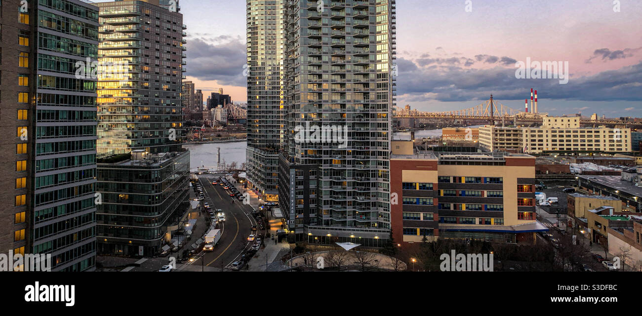 Luxury rental buildings in center Blvd, Long Island City at sunset Stock Photo