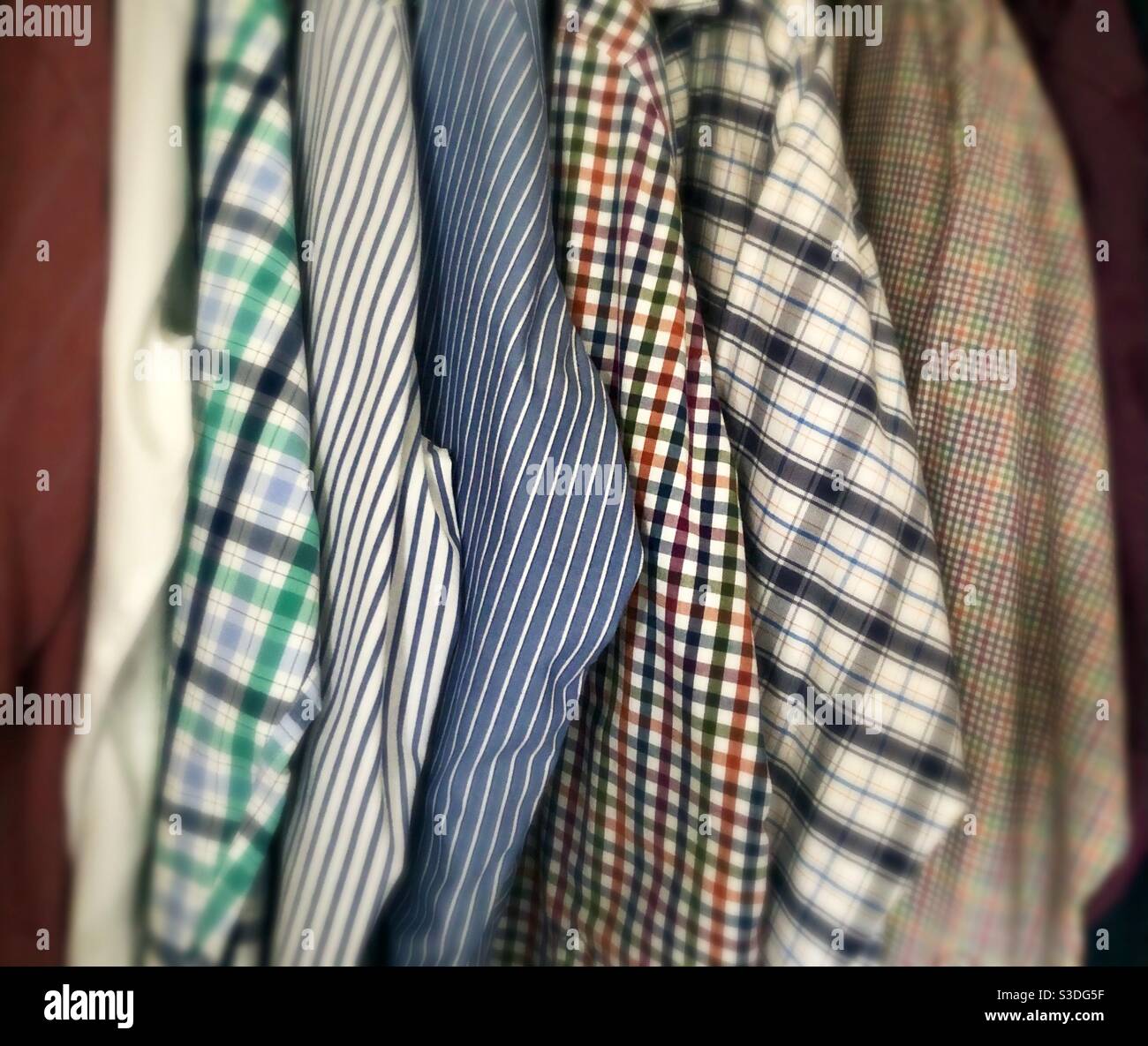 Rail of shirts hi-res stock photography and images - Alamy