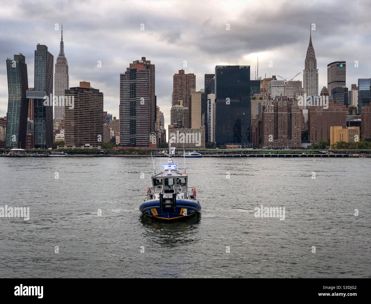 NYPD fast boat patrolling on the East River during the UNGA - Smartphone Captured Stock Image