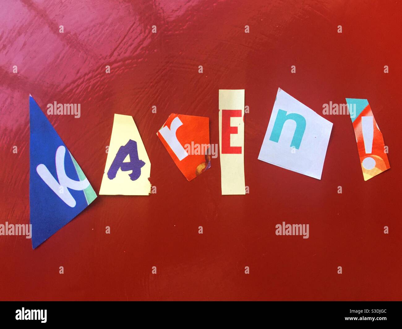 Ransom note style Cut out spelling the pejorative term Karen, a demanding condescending racist white woman, USA - Smartphone Captured Stock Image