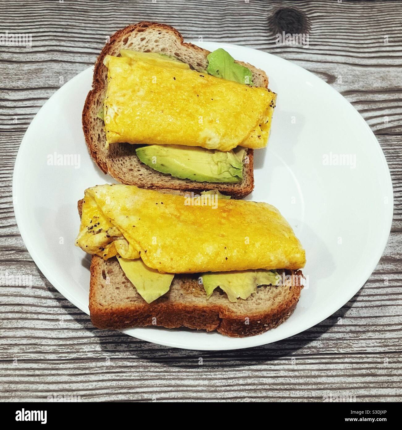 OpenFaced Avocado Omelette Sandwich Stock Photo Alamy