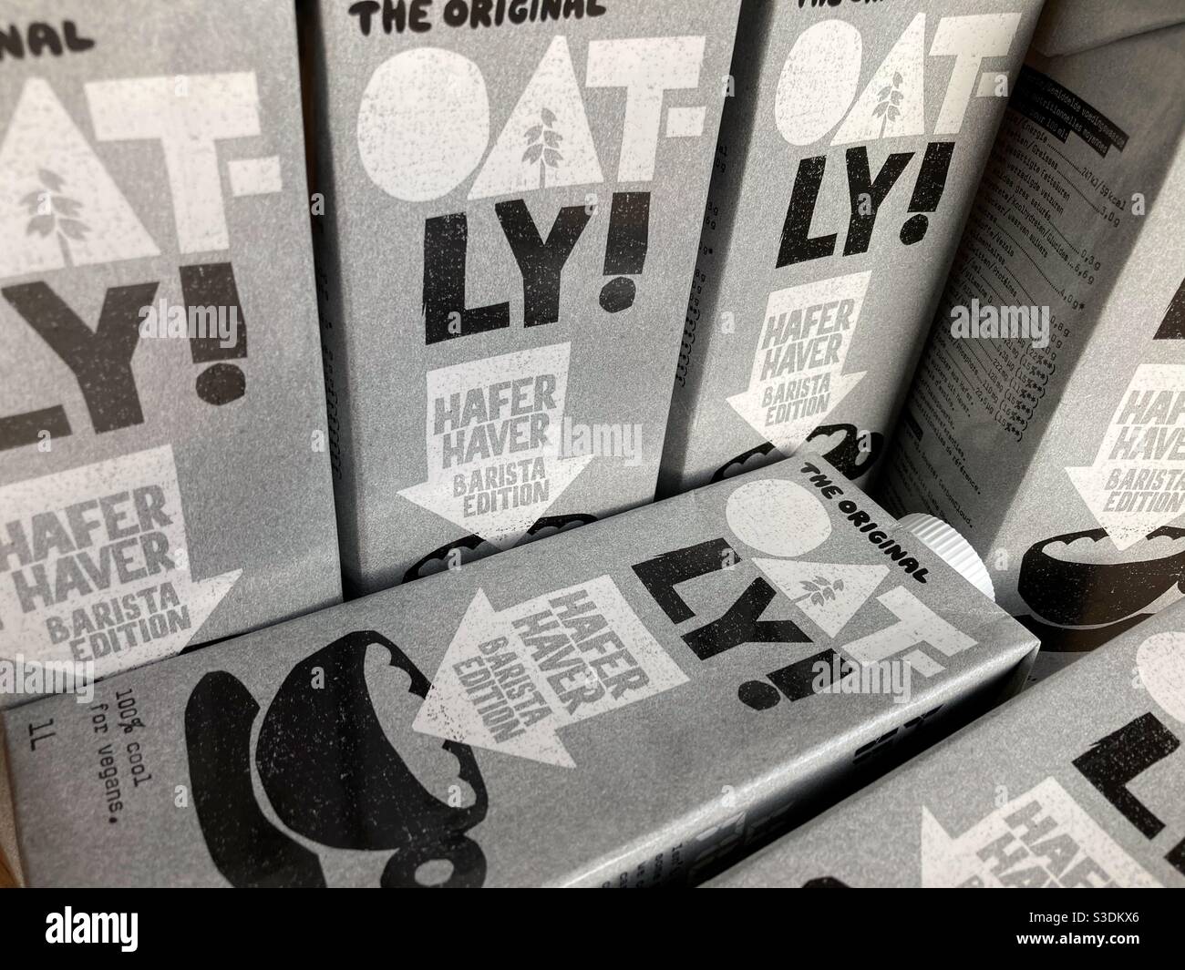 Six cartons of Oatly oat milk drink - Smartphone Captured Stock Image