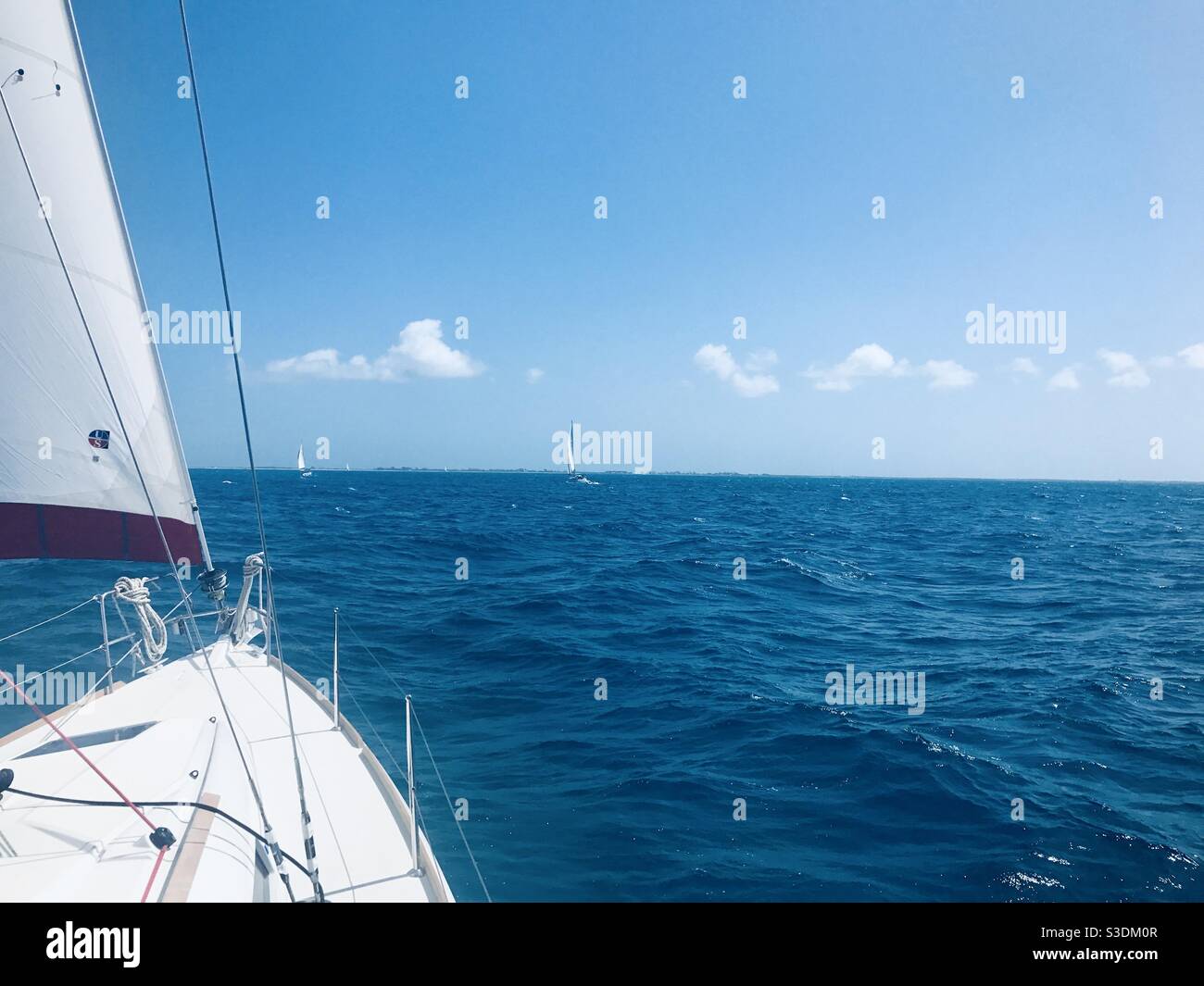The bow of a 38ft sailing boat yacht at sea with the jib set in the British Virgin Islands, The
