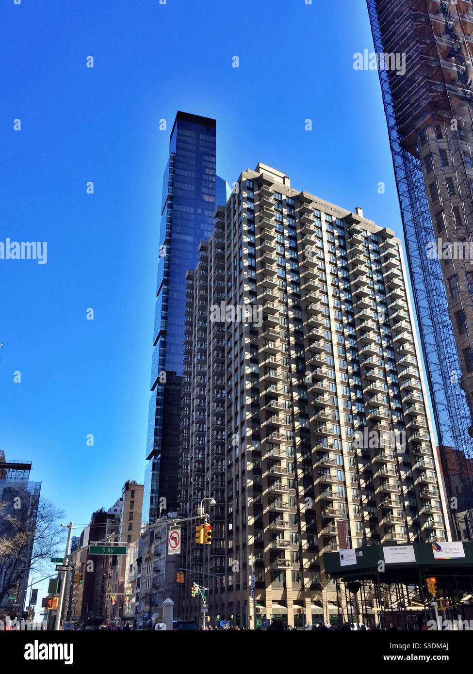 Hi rise residential apartment buildings on 23rd St. in the flatiron District of Manhattan, NYC, USA - Smartphone Captured Stock Image
