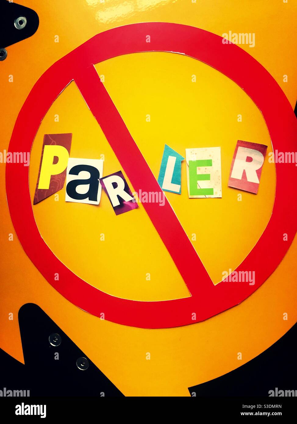 The concept of cancel parler using cut out paper letters in the ransom note affect typography inside the international no symbol, USA - Smartphone Captured Stock Image