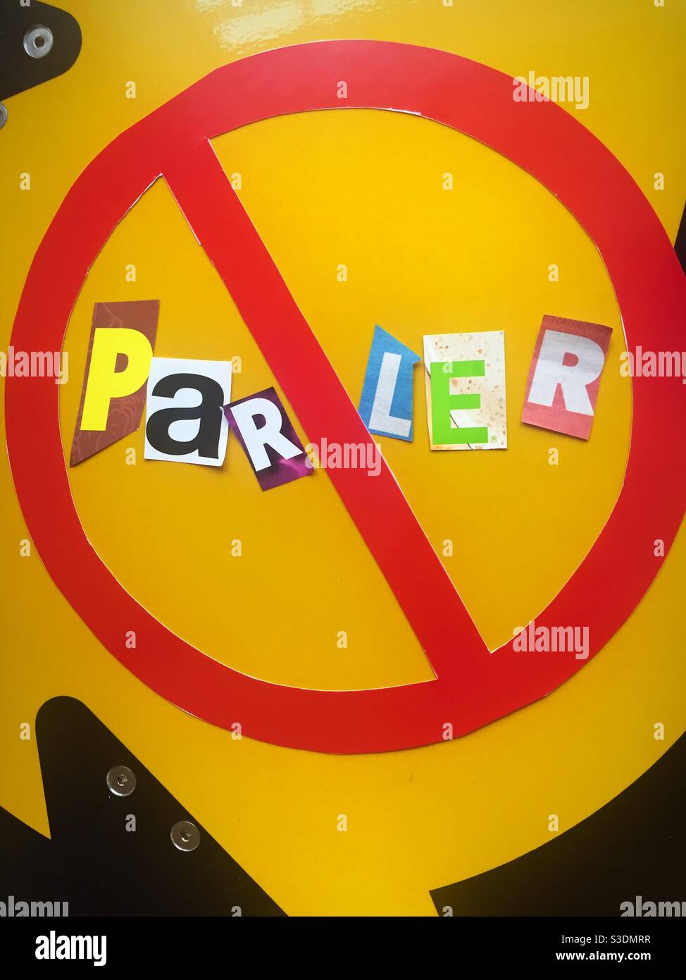 Universal no symbol over the ransom note style word parler, USA - Smartphone Captured Stock Image