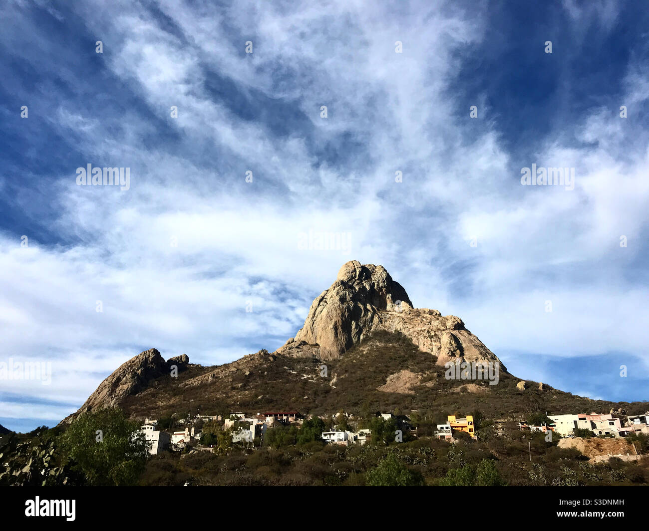 The Peña de Bernal monolite mountain in San Sebastian Bernal, Mexico - Smartphone Captured Stock Image