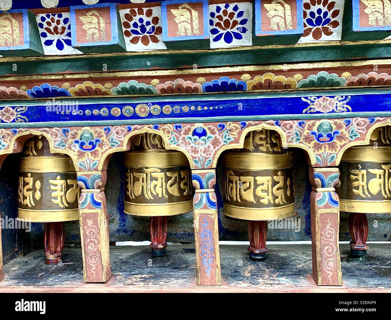Buddhist prayer wheels Stock Photo Alamy