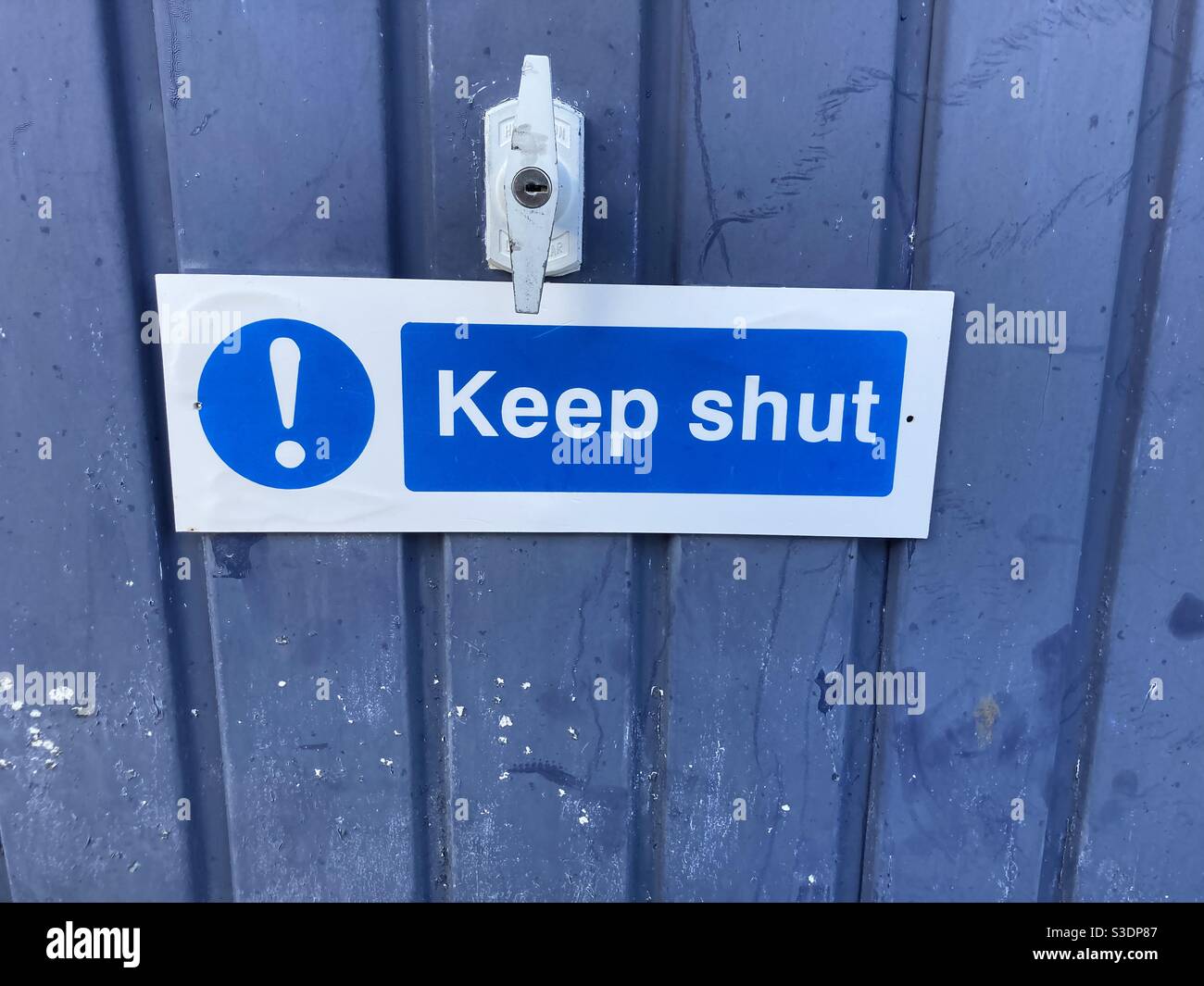 A keep shut sign Stock Photo