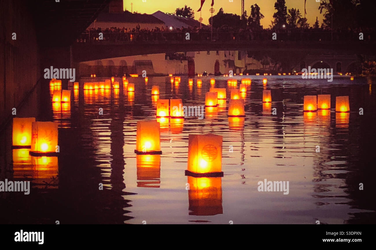 Floating lanterns on Rio Nabão, Tomar. Portugal - June 2019 - Smartphone Captured Stock Image