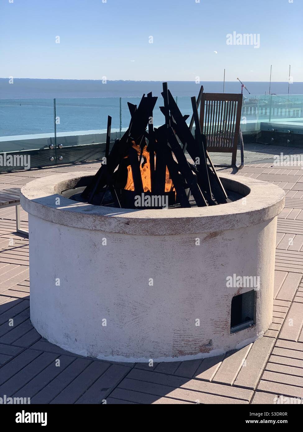 Fire pit overlooking the ocean at the Ocean Casino Resort, Atlantic City, New Jersey, United States - Smartphone Captured Stock Image