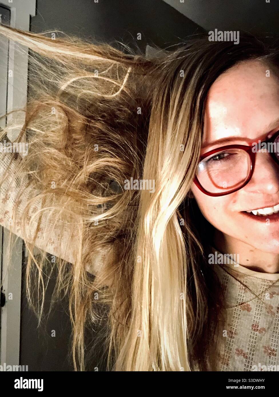 When you can’t find your hair brush Stock Photo