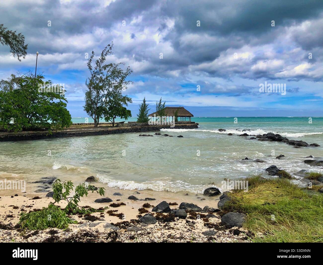 Pier on a little beach in Mont Choisy, Mauritius. - Smartphone Captured Stock Image