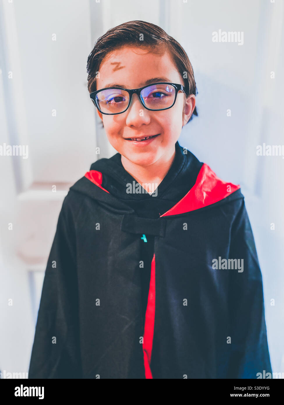 A young boy dressed up as Harry Potter for World Book Day. Stock Photo