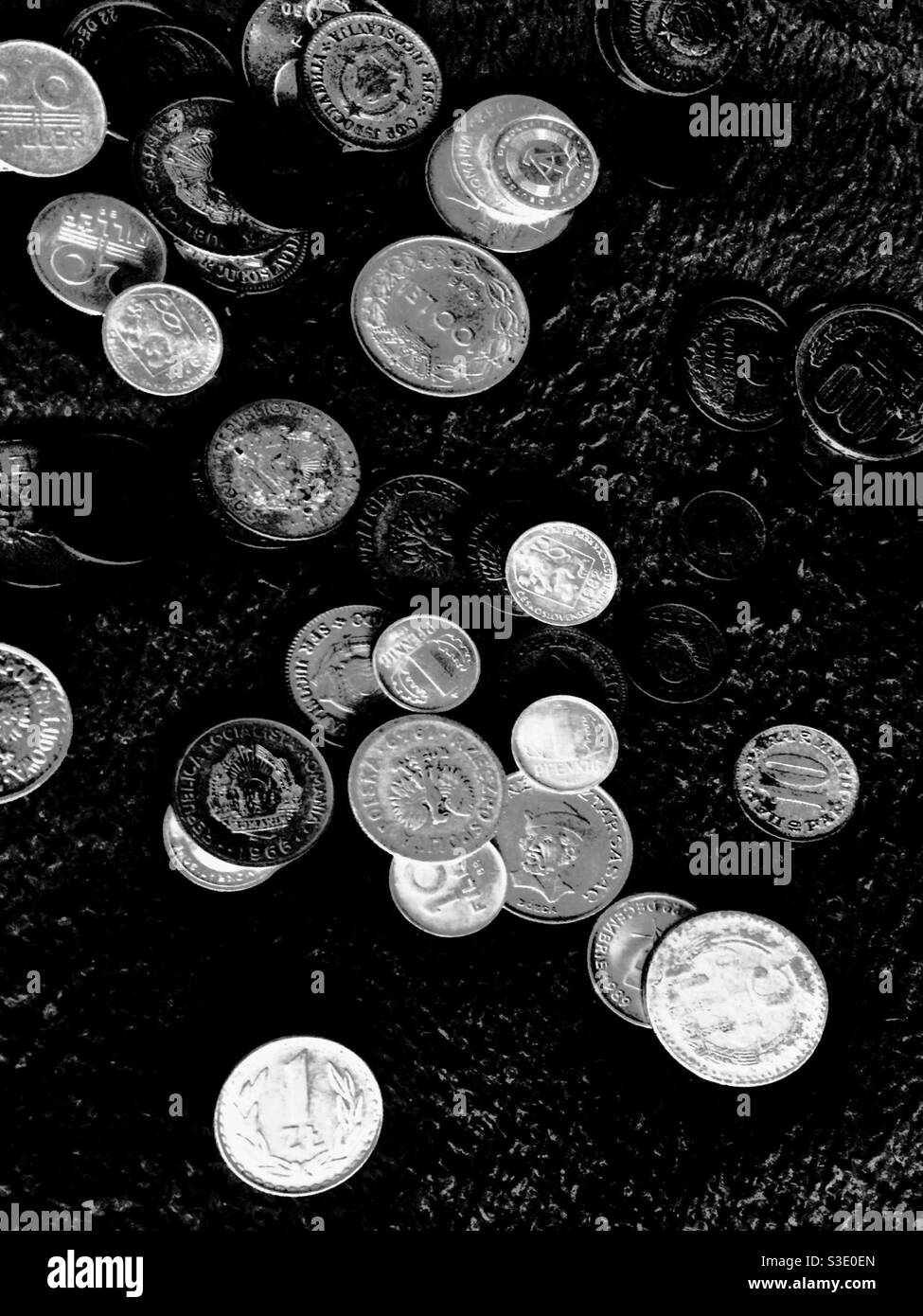 Coins from all over the world Stock Photo