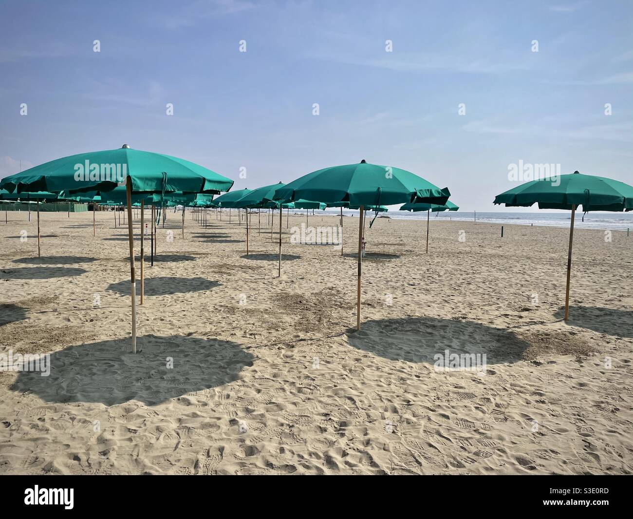 Umbrellas parasols on the beach in Forte dei marmi Italy Stock Photo